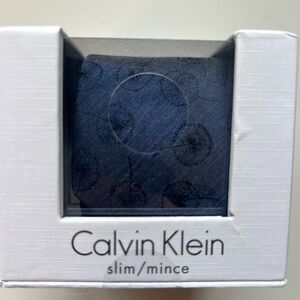 Calvin Klein slim light blue pattern tie brand new in box never opened.